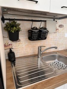 A kitchen or kitchenette at Little house Lezzeno