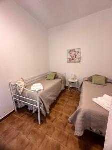 A bed or beds in a room at Little house Lezzeno