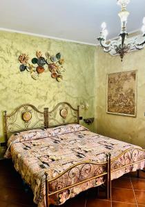 Postel nebo postele na pokoji v ubytování La Mammola Bed&Breakfast