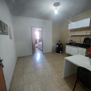 Η κουζίνα ή μικρή κουζίνα στο Flat estação