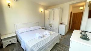 Postel nebo postele na pokoji v ubytování Guest House Bonaca