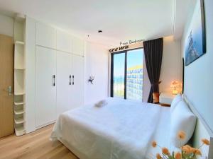 Postel nebo postele na pokoji v ubytování Apartment in resort 5 star Hội An Beach Việt Nam