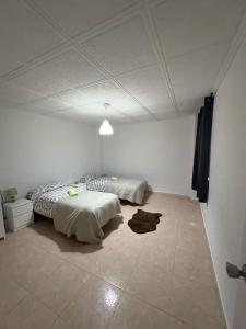 Ένα ή περισσότερα κρεβάτια σε δωμάτιο στο Appartement Célia