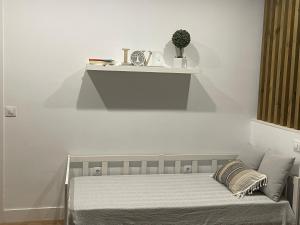 A bed or beds in a room at Torre de Ambroz