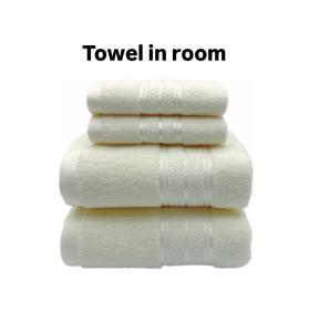 a stack of white towels in a pile at Only female ladies only Private room shared bathroom of a residential tower vs pool view & downtown view & pv rooftop parking minimum staying of 5 nights in Dubai
