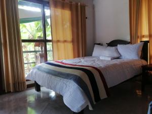 Curitagua Hotel Campestre客房内的一张或多张床位