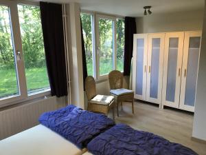 Postel nebo postele na pokoji v ubytování Bungalowpark Simpelveld - Delta 121