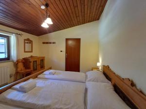 Postelja oz. postelje v sobi nastanitve Apartment Schmid - Steinbock Lodges