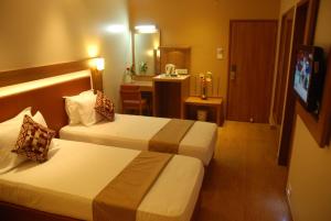 Hotel Rajtara客房内的一张或多张床位