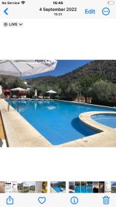 a collage of two pictures of a swimming pool at Large 1 bed apartment in the beautiful countryside in Rute
