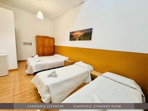 Hotel Kasa客房内的一张或多张床位