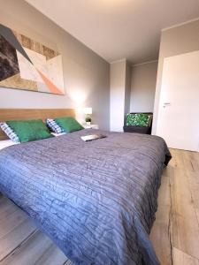 Postel nebo postele na pokoji v ubytování Chill Apartments City Link