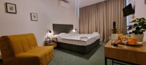 TV a/nebo společenská místnost v ubytování Hotel Legie