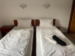 Postel nebo postele na pokoji v ubytování Penzion Janata
