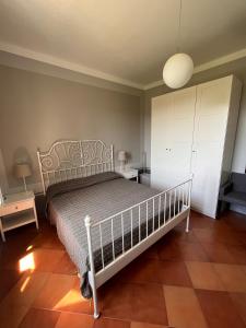 Ένα ή περισσότερα κρεβάτια σε δωμάτιο στο Toscana in Città - Ampio APT immerso nella natura