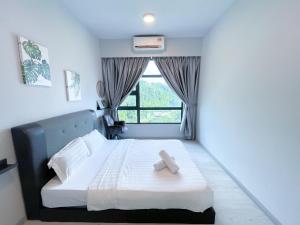 Postel nebo postele na pokoji v ubytování J&H JESSELTON QUAY lSLAND TRIP