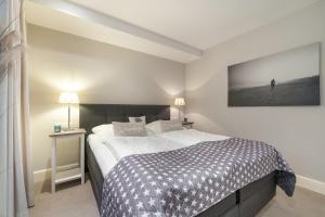 Ein Bett oder Betten in einem Zimmer der Unterkunft Haus Seaside