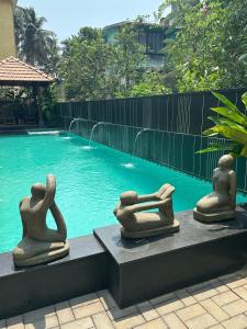 Bazén v ubytování Radha House Siolim A Boutique Hotel nebo v jeho okolí