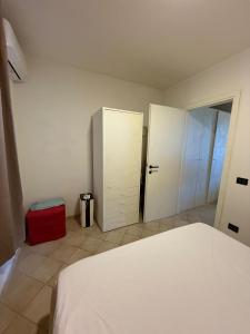 Ένα ή περισσότερα κρεβάτια σε δωμάτιο στο Appartamento Napoleon Isola D Elba