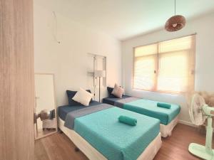 Ένα ή περισσότερα κρεβάτια σε δωμάτιο στο The Grove Guesthouse +10 φωτογραφίες