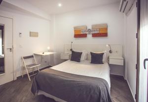 Posteľ alebo postele v izbe v ubytovaní Habitaciones El Olivo, Calidad y Reformardo