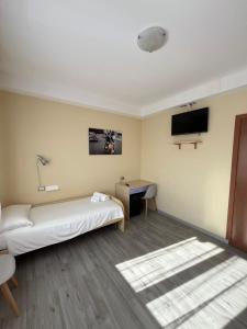 TV a/nebo společenská místnost v ubytování B&B Garzola