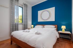 Posteľ alebo postele v izbe v ubytovaní Lux Split Centre Apartments