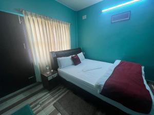 Katil atau katil-katil dalam bilik di Hotel Mina's dreams