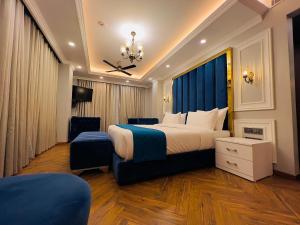 Postel nebo postele na pokoji v ubytování Claret Inn & Suites - Dalhousie