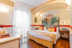 Posteľ alebo postele v izbe v ubytovaní Art Hotel Commercianti
