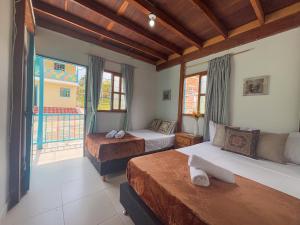 Fotografie z fotogalerie ubytování Las Casas de Tomate v destinaci Guatapé