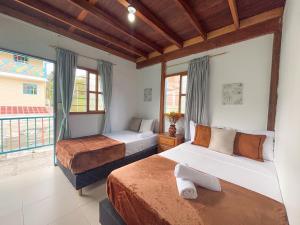 Fotografie z fotogalerie ubytování Las Casas de Tomate v destinaci Guatapé