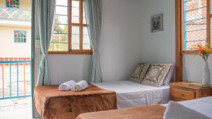 Fotografie z fotogalerie ubytování Las Casas de Tomate v destinaci Guatapé