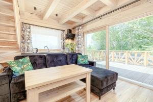 Χώρος καθιστικού στο FH Roomflation Baltic 1 linkes Haus