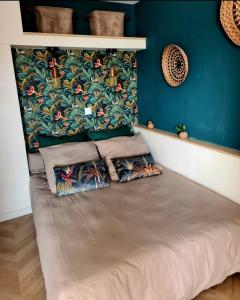 Ένα ή περισσότερα κρεβάτια σε δωμάτιο στο Appartement sur le Port de Meze