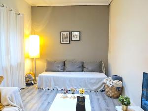 A bed or beds in a room at Gran piso pleno centro. Plaza del Pilar + Desayuno