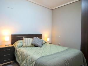 A bed or beds in a room at Gran piso pleno centro. Plaza del Pilar + Desayuno