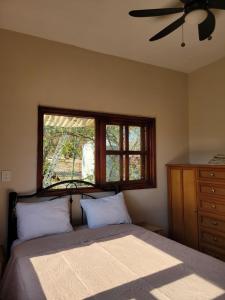 Ένα ή περισσότερα κρεβάτια σε δωμάτιο στο Casa de huéspedes Zaadxil Doo +29 φωτογραφίες