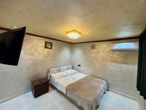 เตียงในห้องที่ Dar Niema
