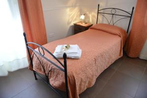 Posteľ alebo postele v izbe v ubytovaní B&B San Leonardo