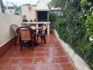 Balkón alebo terasa v ubytovaní JARDIN, TERRAZA Y BARBACOA