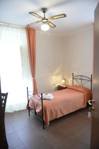 Posteľ alebo postele v izbe v ubytovaní B&B San Leonardo