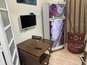 TV a/nebo společenská místnost v ubytování Mody Studio