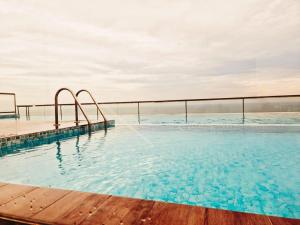 a swimming pool on the roof of a building at K&S Luxury Apartment in Dehiwala