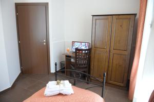 Posteľ alebo postele v izbe v ubytovaní B&B San Leonardo