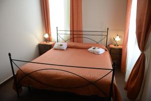 Posteľ alebo postele v izbe v ubytovaní B&B San Leonardo