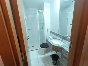 Ένα μπάνιο στο Suite em Hotel