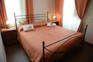 Posteľ alebo postele v izbe v ubytovaní B&B San Leonardo