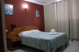 Krevet ili kreveti u jedinici u objektu Hotel Toledo