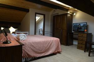 Posteľ alebo postele v izbe v ubytovaní B&B San Leonardo